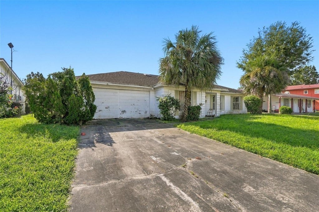 Photo of 1147 Coretta Way, Orlando, FL 32805 (MLS # O6443708)