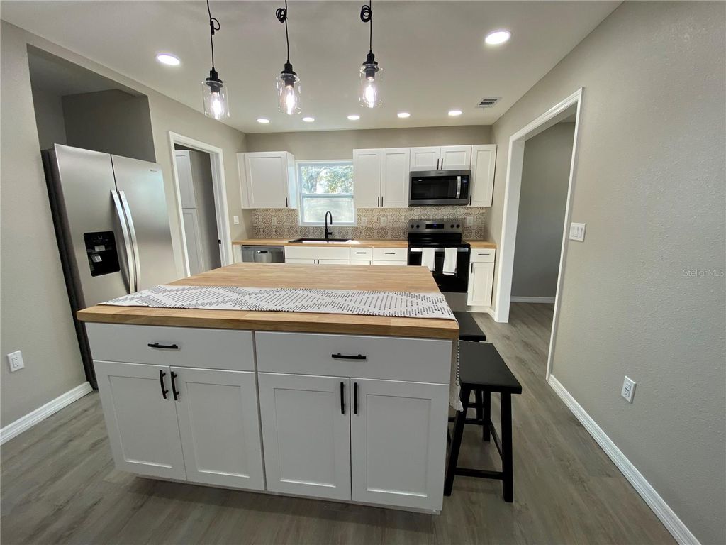 Photo of 12704 Lacey Drive, New Port Richey, FL 34654 (MLS # TB8475995)