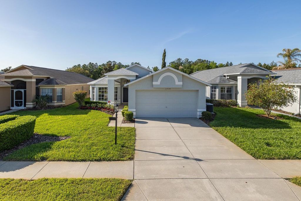 Photo of 11718 Wheatfield Loop, Hudson, FL 34667 (MLS # W7884502)