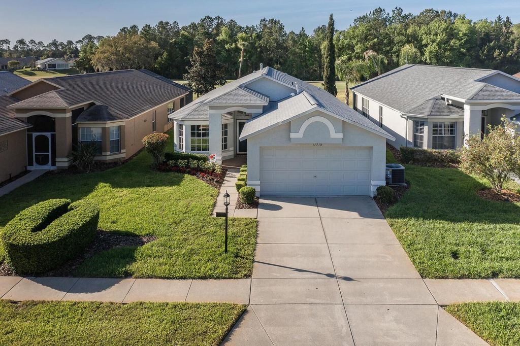 Photo of 11718 Wheatfield Loop, Hudson, FL 34667 (MLS # W7884502)