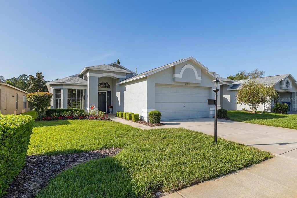 Photo of 11718 Wheatfield Loop, Hudson, FL 34667 (MLS # W7884502)