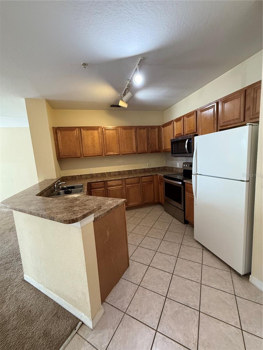 6169 METROWEST BOULEVARD 208