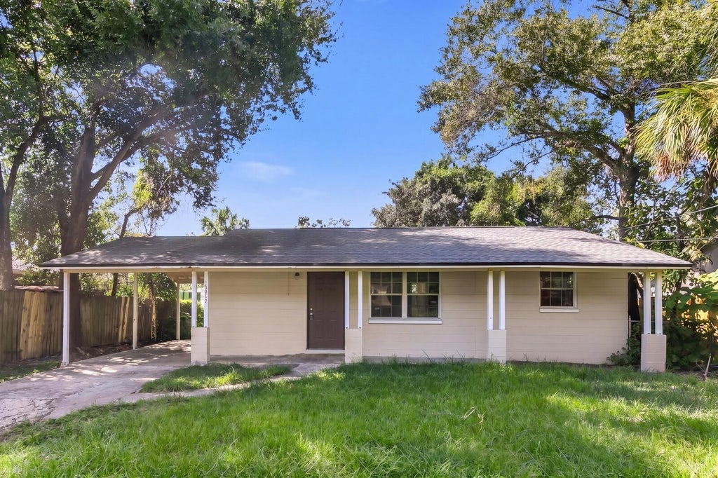 Photo of 10012 N 14th Street, Tampa, FL 33612 (MLS # TB8559131)
