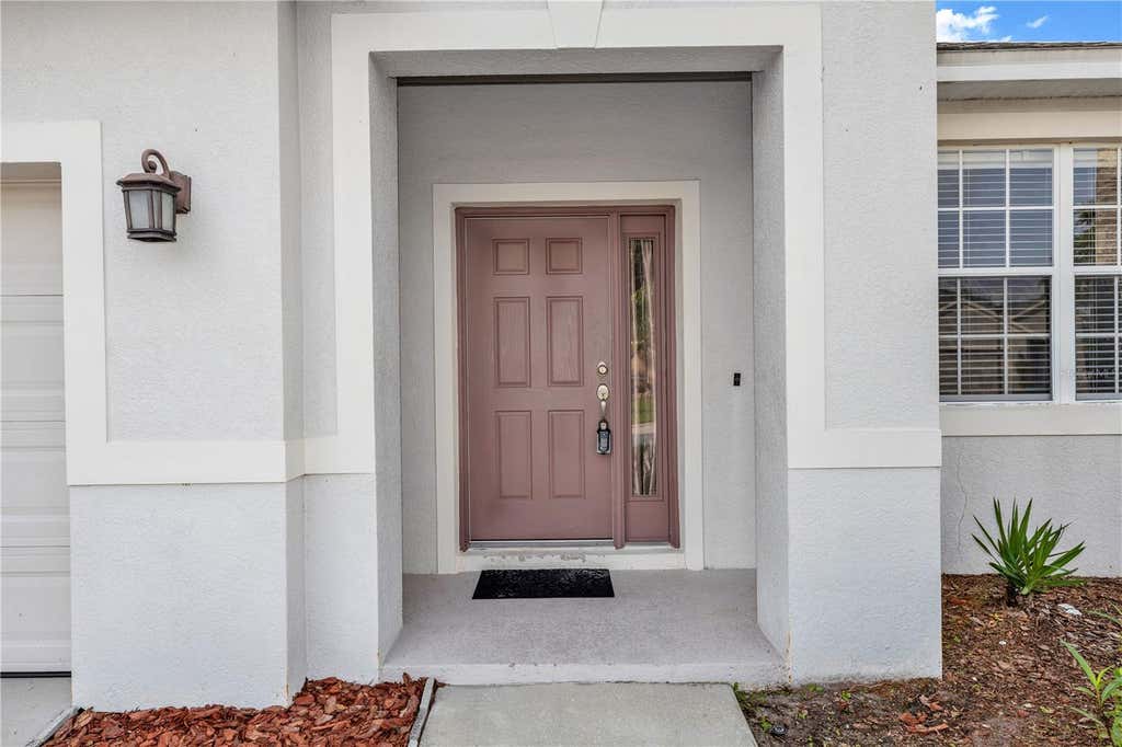 Photo of 14249 Queenside Street, Orlando, FL 32824 (MLS # O6429881)