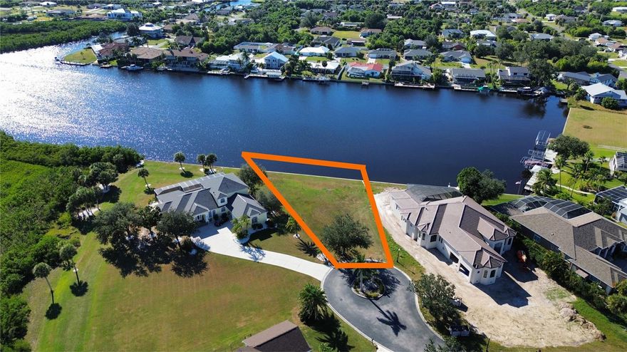 Sailboat Waterfront Lot – McGrath Point Estates
Fantastic opportunity to own this oversized, sailboat-access residential lot in the exclusive gated community of McGrath Point Estates. With approximately 207 feet of water frontage and a BRAND NEW concrete seawall, this cleared half-acre+ lot provides unobstructed water views and plenty of space to build your Florida dream home with pool.
Enjoy quick access to Charlotte Harbor and the Gulf with no bridges—reach open water in under 5 minutes! Nestled on a peaceful cul-de-sac and surrounded by beautiful estate homes, this property offers the perfect blend of privacy and prestige.
Nearby, the Port Charlotte Beach Complex features tennis, basketball, community pool, bocce ball, picnic areas, fishing pier, boat ramp, and a sandy beach on Charlotte Harbor. Centrally located with easy access to US-41, I-75, downtown Punta Gorda, shopping, dining, hospitals, and golf, this is truly one of the best waterfront building sites in Charlotte County.

Oversized lot + sailboat access + gated community = Best of the Best!