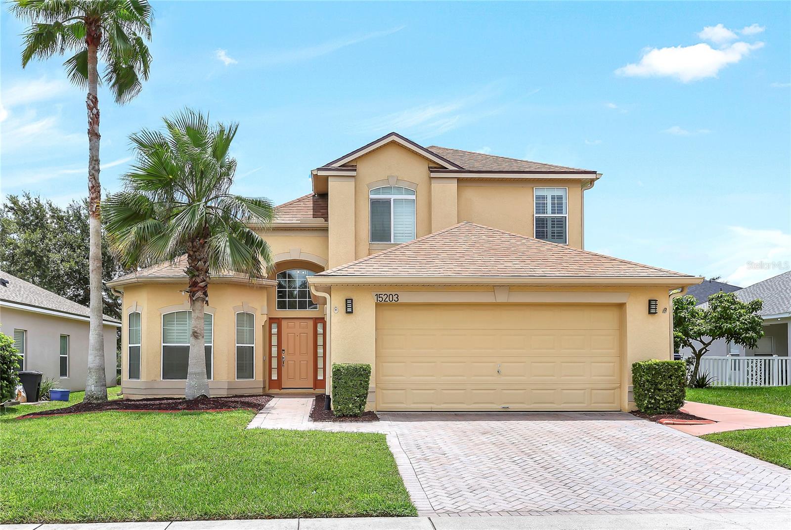 This is the one you've been waiting for.
From the moment you step inside, this stunning East Orlando home will capture your heart. Soaring vaulted ceilings, rich dark wood floors, and a flood of natural light welcome you into a space that feels both grand and inviting.
The open-concept layout is perfect for everyday living and entertaining. A spacious formal living and dining area sets the tone, while the heart of the home—an elegantly updated kitchen—features granite countertops, tile backsplash, 42” cabinets with crown molding, stainless steel appliances, and a breakfast bar overlooking the family room and tranquil pond views.
The first-floor primary suite is a private retreat with tray ceilings, French doors to the screened-in patio, dual walk-in closets, and a luxurious en-suite bathroom with quartz countertops and upgraded finishes. Upstairs, a versatile loft provides the perfect flex space—ideal for a home office, playroom, or easy conversion to a 5th bedroom. Three additional bedrooms, all generously sized with large closets and ceiling fans, share a freshly remodeled and well-appointed bathroom with a beautiful double vanity and shower.
Step outside to your personal sanctuary: a screened-in patio and peaceful pond view perfect for unwinding or entertaining. A 720 sq. ft. pad with plumbing and electric is ready for your custom outdoor kitchen or addition—a rare bonus with endless potential.
Additional highlights include: plantation shutters in every room, custom flooring, roof (2020),HVAC 2020 new water heater (2024), and a prime location just minutes from UCF, Waterford Lakes, Research Park, Oviedo, and major roadways (417 & 408). The community park is just a short stroll away, and the beach is under an hour’s drive.
This home checks every box: space, style, upgrades, and location. Come experience it for yourself—before someone else does.