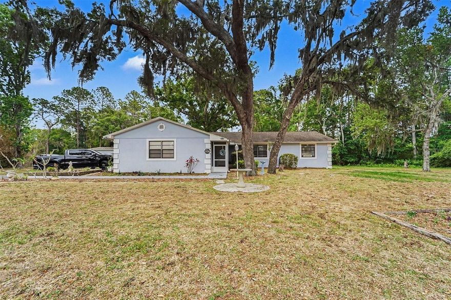 Honey stop the car! This is the one! Beautiful cleared almost 1 acre lot. BRING YOUR TOYS! NO HOA/NO CDD - plenty of room for boat storage, RV storage and a new pool. Exterior block 14x14 shed, great feature! Inside enjoy a turnkey fully renovated home with upgraded kitchen and bathrooms. Open floor plan with screened in sunroom on the back of the home. Large open deck, perfect for grilling and entertaining. New AC, new water heater and water softner. Golf Community - enjoy being 2 mins from the 1st tee box. Close to shopping, entertainment and schools. Easy access to 75. Schedule your showing today, won't last!