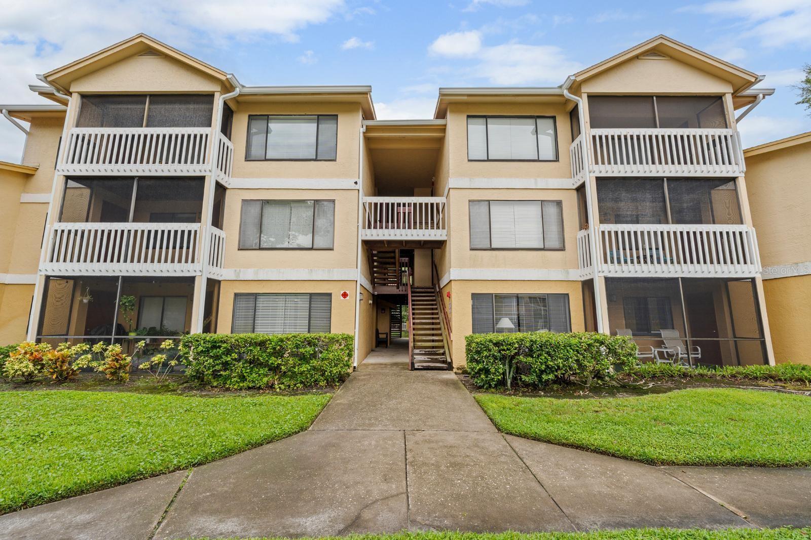 Welcome to your new home at BELLEAIR VILLAGE CONDO, a beautifully maintained community in the heart of Clearwater! This spacious 2-bedroom, 2-bath condo is located on the second floor of a 3-story building and offers an inviting open floor plan with the kitchen seamlessly connected to the living and dining areas. Step out from the living room onto your private balcony, perfect for enjoying your morning coffee or evening breeze.
The kitchen features newer stainless steel appliances, and a convenient laundry closet with a stackable washer and dryer is located in the corridor. Important updates include a new A/C system (2023) and a water heater (2021), giving you peace of mind.
This vibrant community offers an array of amenities: a sparkling pool with sundeck, relaxing spa and sauna, a fitness room with workout equipment, and a beautiful clubhouse complete with kitchen and fireplace—ideal for gatherings. An assigned carport is included, with additional guest parking available.
Condo fees cover: clubhouse, pool, hot tub, sauna, gym, ground and exterior maintenance, trash service, roof upkeep, and security cameras around the premises.
Don’t miss this opportunity to own a well-maintained condo in a prime Clearwater location with resort-style amenities!