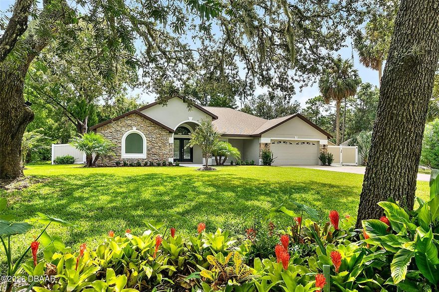 Move-in ready home on a large cul-de-sac lot in the highly desirable Southern Trace community of Ormond Beach. This spacious 4-bedroom, 2-bath home offering over 2,300 square feet sits on nearly a 1/3-acre lot, providing the perfect combination of space, privacy, and convenience. Over $150,000 has been invested in recent renovations, giving buyers peace of mind with major systems already updated. Improvements include a roof replaced in 2023, HVAC system replaced in 2020, and water heater replaced in 2024, along with double-pane energy-efficient windows that carry a lifetime warranty. Inside, the home features a bright open floor plan with vaulted ceilings and abundant natural light. The split-bedroom layout offers privacy for the primary suite while the large living and dining areas provide an ideal setting for everyday living and entertaining. The primary suite includes a private bath and dual his-and-hers walk-in closets, creating a comfortable retreat with excellent storage Three additional bedrooms provide flexible space for family, guests, or a home office.
Recent interior updates include luxury flooring throughout, fresh interior and exterior paint, updated lighting and ceiling fans, modern plumbing fixtures, and updated window treatments. The kitchen and living areas flow seamlessly for a functional and welcoming layout.
The exterior has also been improved with full rain gutters, generator outlet, new garage door opener, garage floor coating, and a fully fenced backyard with room for boat or RV storage and the potential for rear gate access. Additional features include a hardwired security system and a newer washer and dryer less than a year old, along with a home warranty and lifetime window warranty for added buyer confidence.
Located in Southern Trace in Ormond Beach, the home is just minutes from shopping, dining, schools, parks, and convenient access to I-95.
Homes in Southern Trace with this level of updates and lot size are rarely available. Buyers looking for a move-in ready home with major systems already updated will want to see this property quickly. Schedule your showing today.