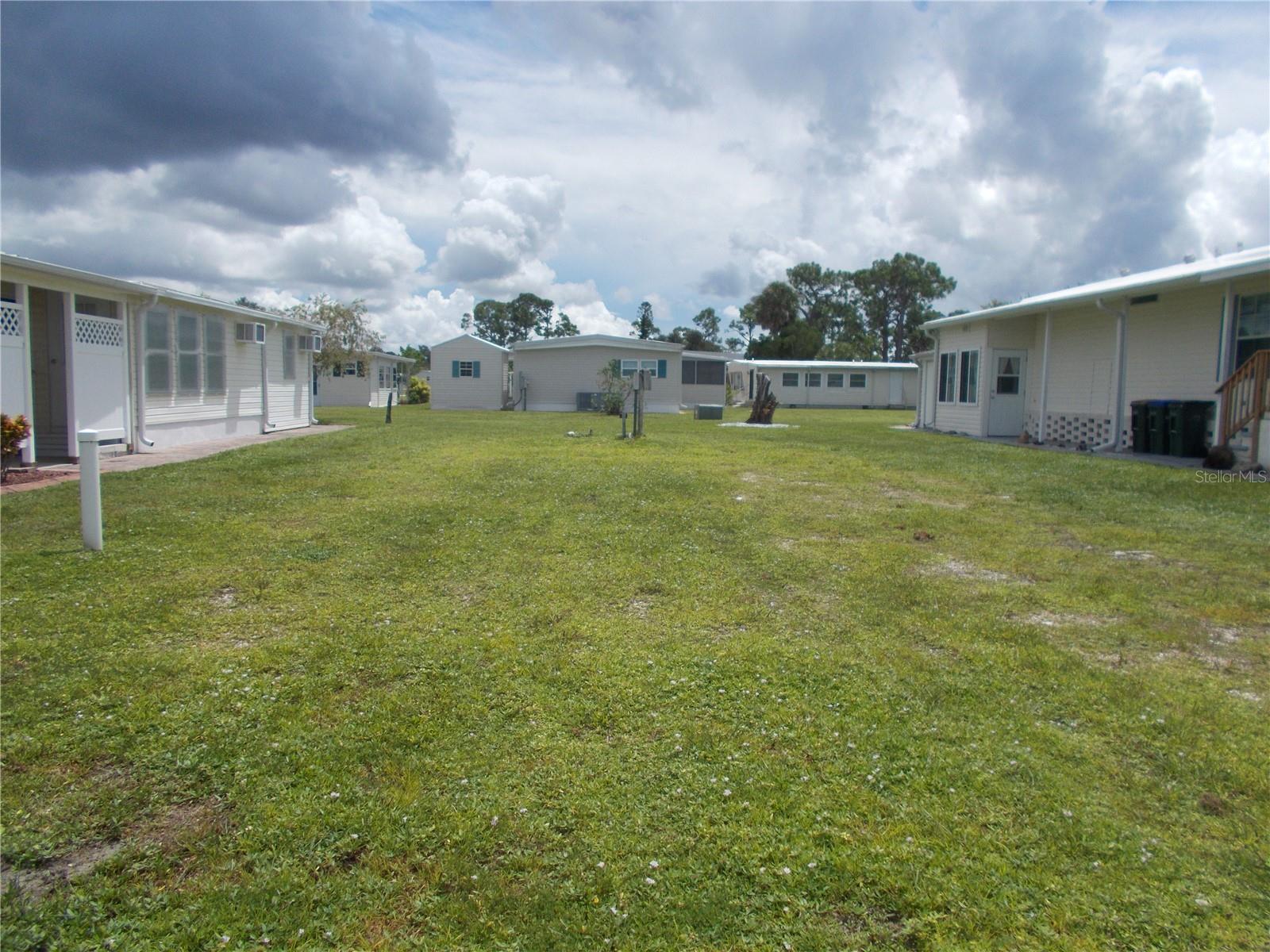 Vacant land in the sought after 55+ Gated Community of Holiday Park and not in the pet section. This land is located on Hikina Drive. This lot is 4809 square feet. In Holiday Park you own the land with a deed and the maintenance fee of $2340.00 a year ($195.00 a month) is included in your taxes. Holiday Park offers many amenities including 2 Pools, Tennis Courts, Pickle Ball, Bocci, Shuffleboard, Laundry, Library, Horseshoes, Bingo, plus other card games, Fitness Room, and so much more. This home has been pulled off. This is a perfect place for your new manufactured home. Come and see!