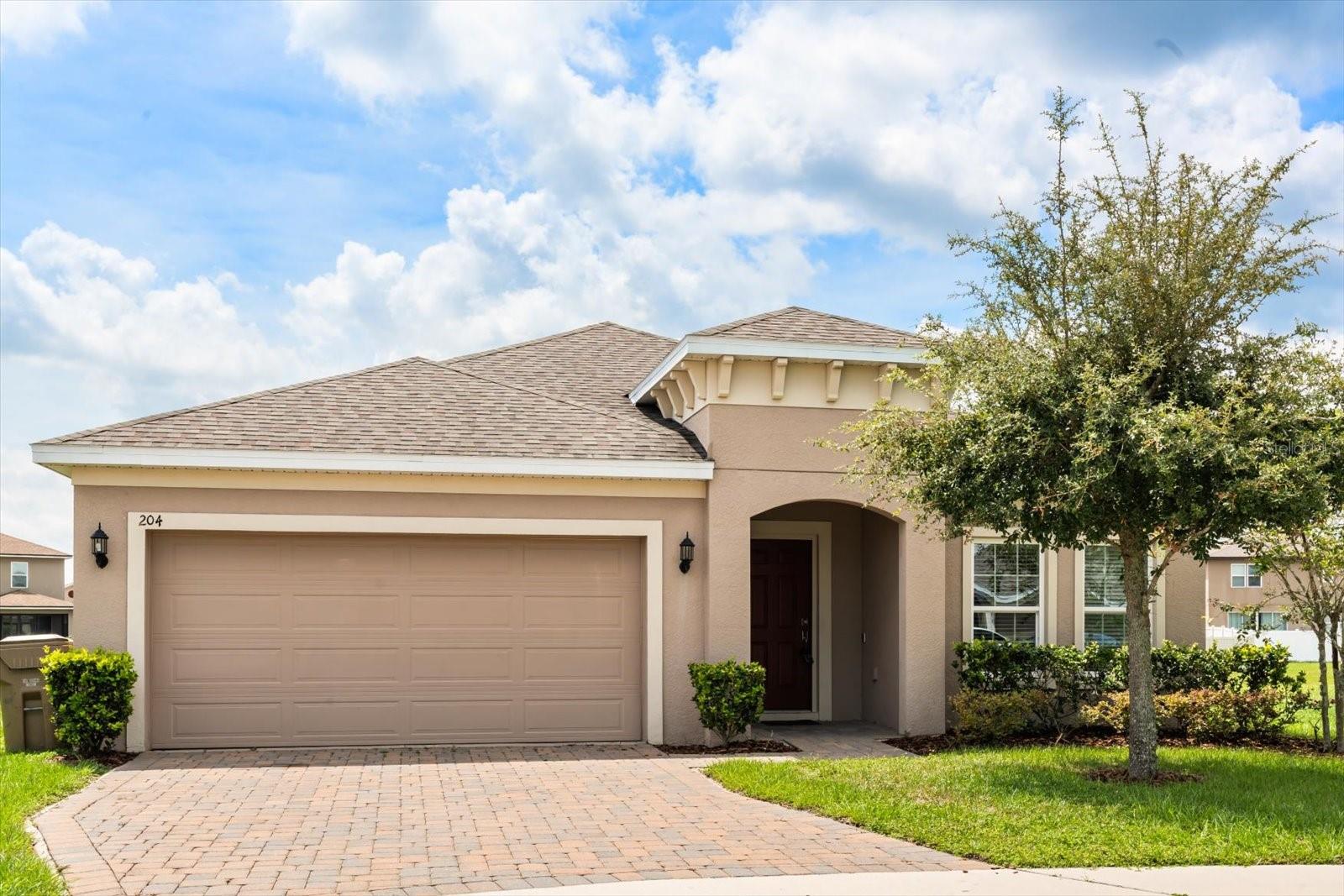 Discover this freshly repainted one-story, 4-bedroom, 2-bathroom home with brand-new carpet and a 2-car garage in the heart of Groveland, featuring an open floor plan where the quartz countertop kitchen flows into the spacious family and dining areas, perfect for entertaining. Enjoy the comfort of an inside laundry room, a serene primary suite with en-suite bath, and a versatile outdoor space ideal for barbecues, gardening, or relaxing. Take advantage of community amenities including a dock, pool, playground, and picnic area, all while being conveniently located near major highways, shopping, and the turnpike—offering both tranquility and accessibility.