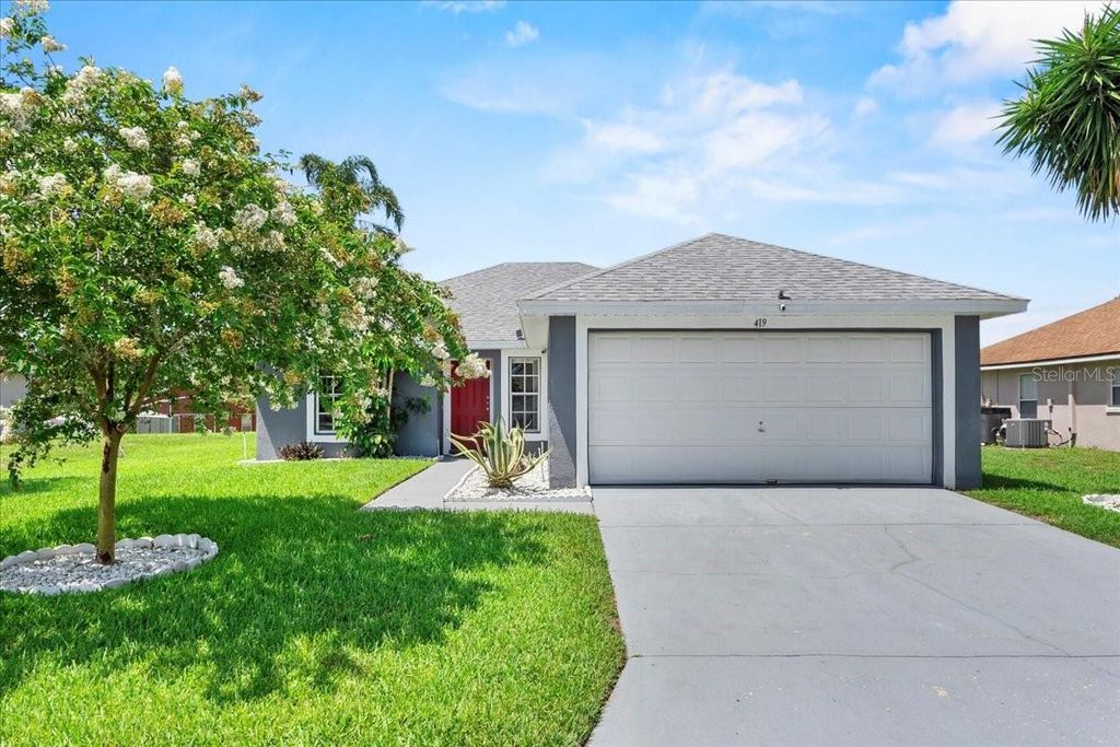 Photo of 419 Wellesly Drive, Davenport, FL 33897 (MLS # P4935282)