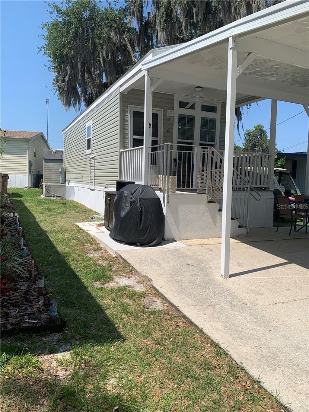 Photo of 699 Cindi Avenue, Leesburg, FL 34788 (MLS # G5103390)