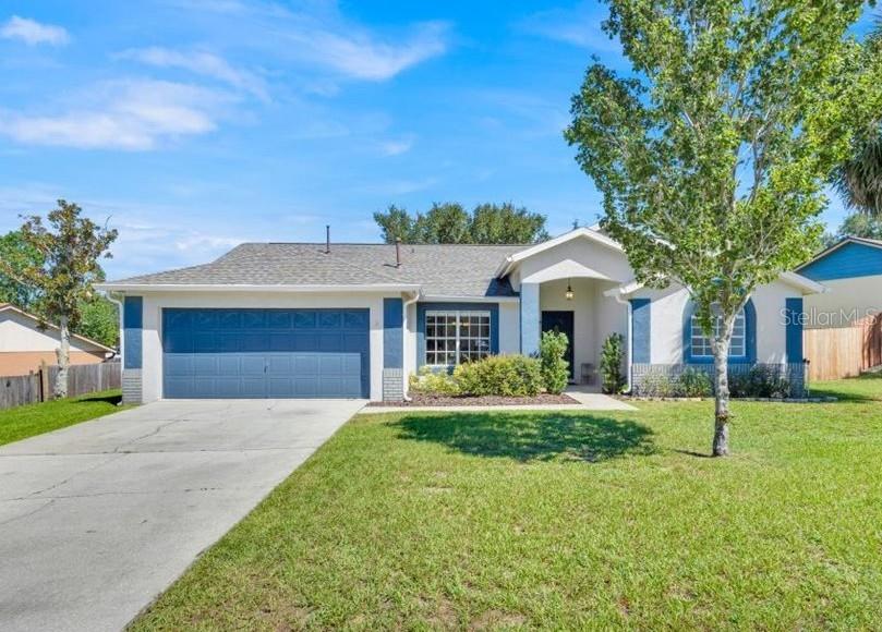 Don’t miss this fantastic opportunity with this MOVE-IN ready, 4-bedroom, 3-bath SPACIOUS HOME with 2,034 sq. ft. in the much sought after Greater Groves community! **VA ASSUMABLE MORTGAGE at 2.375%!** *2024 NEW ROOF & 2020 A/C* This UPDATED HOME provides ample room for everyone with, LUXURY VINYL PLANK FLOORING, SPACIOUS BEDROOMS and UPDATED KITCHEN & BATHROOMS. The 4th bedroom with separate bath is also perfect for a guest or IN-LAW SUITE. Chefs will feel at home in the UPDATED KITCHEN with GRANITE COUNTERTOPS, LOTS OF COUNTER SPACE, STAINLESS STEEL APPLIANCES THAT INCLUDES A GAS STOVE! Enjoy either sit down meals in the formal dining room or a casual bite to eat at the breakfast bar with counter seating or in the adjacent breakfast nook. Whether you’re planning a movie night, game night, or other entertaining at home, you’ll find more than enough space for your gatherings with both a family room open to the kitchen and a formal living room off the foyer. The OWNER'S SUITE is a luxurious retreat with a LARGE BEDROOM with its own private slider out to the patio and EN SUITE BATH with dual vanities, a LARGE WALK-IN SHOWER, and a RELAXING TUB. Step outside to your own backyard paradise with a FENCED YARD, HUGE COVERED PATIO, and PLENTY OF ROOM FOR A FUTURE POOL. Greater Groves features a variety of amenities including a COMMUNITY POOL, TENNIS/PICKLE BALL COURTS, PLAYGROUND & BASKETBALL COURT with a LOW HOA. It allows SHORT-TERM & LONG-TERM rentals, making this home a fantastic option whether you’re looking for primary residence, vacation home, or investment property. PLUS you’ll have easy access to THEME PARKS, shopping, dining, and more in a prime location. Zoned for TOP RATED SCHOOLS. Schedule your private showing today!