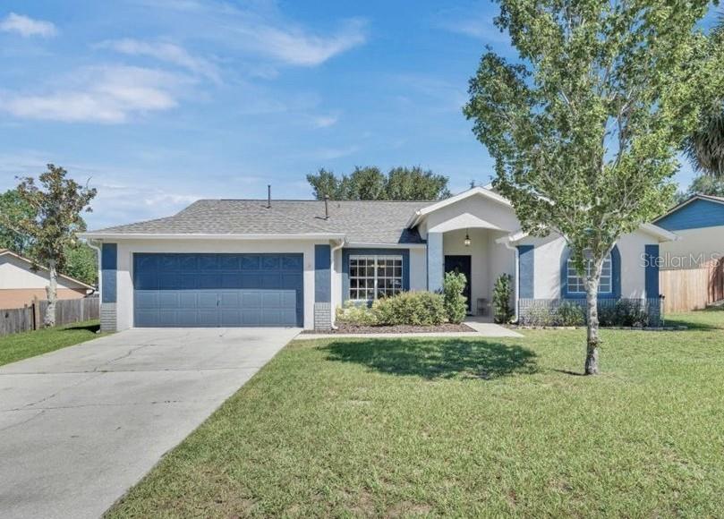 Don’t miss this fantastic opportunity with this MOVE-IN ready, 4-bedroom, 3-bath SPACIOUS HOME with 2,034 sq. ft. in the much sought after Greater Groves community! **VA ASSUMABLE MORTGAGE at 2.375%!** *2024 NEW ROOF & 2020 A/C* This UPDATED HOME provides ample room for everyone with, LUXURY VINYL PLANK FLOORING, SPACIOUS BEDROOMS and UPDATED KITCHEN & BATHROOMS. The 4th bedroom with separate bath is also perfect for a guest or IN-LAW SUITE. Chefs will feel at home in the UPDATED KITCHEN with GRANITE COUNTERTOPS, LOTS OF COUNTER SPACE, STAINLESS STEEL APPLIANCES THAT INCLUDES A GAS STOVE! Enjoy either sit down meals in the formal dining room or a casual bite to eat at the breakfast bar with counter seating or in the adjacent breakfast nook. Whether you’re planning a movie night, game night, or other entertaining at home, you’ll find more than enough space for your gatherings with both a family room open to the kitchen and a formal living room off the foyer. The OWNER'S SUITE is a luxurious retreat with a LARGE BEDROOM with its own private slider out to the patio and EN SUITE BATH with dual vanities, a LARGE WALK-IN SHOWER, and a RELAXING TUB. Step outside to your own backyard paradise with a FENCED YARD, HUGE COVERED PATIO, and PLENTY OF ROOM FOR A FUTURE POOL. Greater Groves features a variety of amenities including a COMMUNITY POOL, TENNIS/PICKLE BALL COURTS, PLAYGROUND & BASKETBALL COURT with a LOW HOA. It allows SHORT-TERM & LONG-TERM rentals, making this home a fantastic option whether you’re looking for PRIMARY RESIDENCE, VACATION HOME OR INVESTMENT PROPERTY. PLUS you’ll have easy access to THEME PARKS, shopping, dining, and more in a prime location. Zoned for TOP RATED SCHOOLS. Schedule your private showing today!