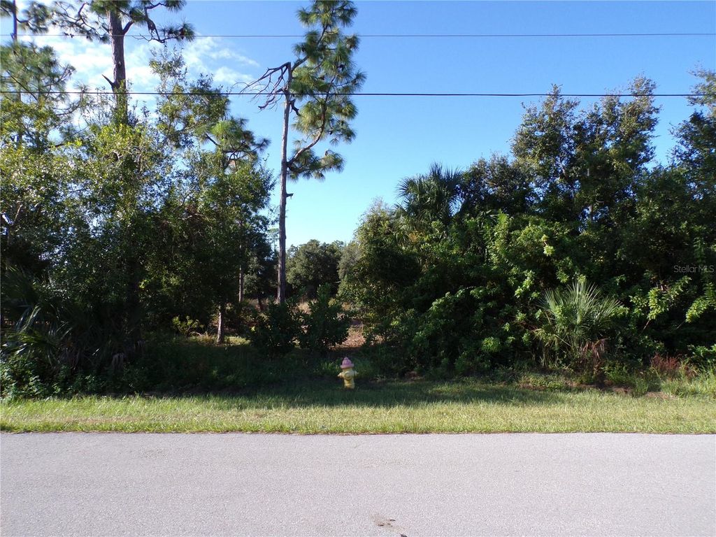 Photo of 25079 Harborside Boulevard, Punta Gorda, FL 33955 (MLS # C7517066)