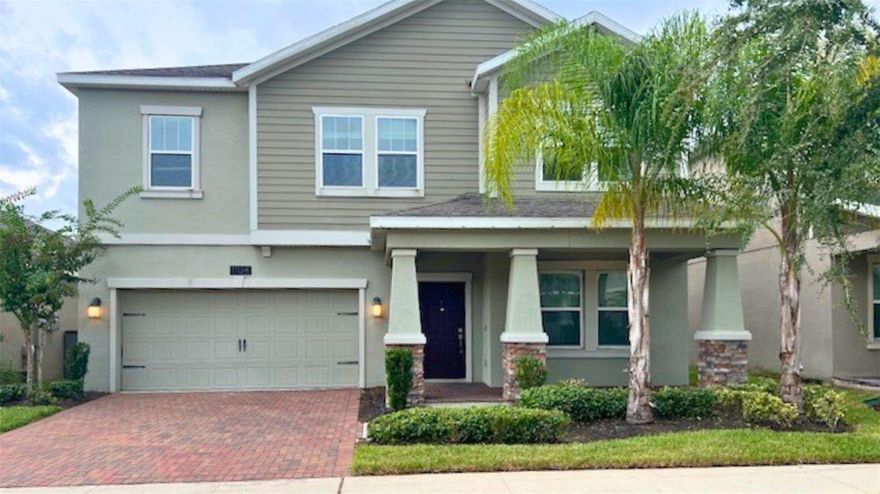 Available November 1st! $0 Application fee for Pre-Approved Applicants. This elegant two-story home features 4 bedrooms and 2.5 bathrooms. Additional space includes an upstairs game room. The kitchen, equipped with granite counters, dark cabinets, and upgraded stainless steel appliances, overlooks the living and dining areas, enhanced by a cozy breakfast nook. The master suite includes a spacious bedroom with a large walk-in closet and a luxurious bathroom featuring an extended vanity, garden tub, and tile shower. Enjoy the front and rear covered patios and a serene lake view from the kitchen and dining room. The home also boasts a two-car garage. Located in The Oaks at Moss Park, the community offers amenities such as a swimming pool, nature trails, ponds, and a tot lot, and is conveniently close to Medical City in Lake Nona as well as major Orlando attractions like Walt Disney World, SeaWorld, and Universal Orlando Resort. Additional fee applies for lawn maintenance. INQUIRE NOW!