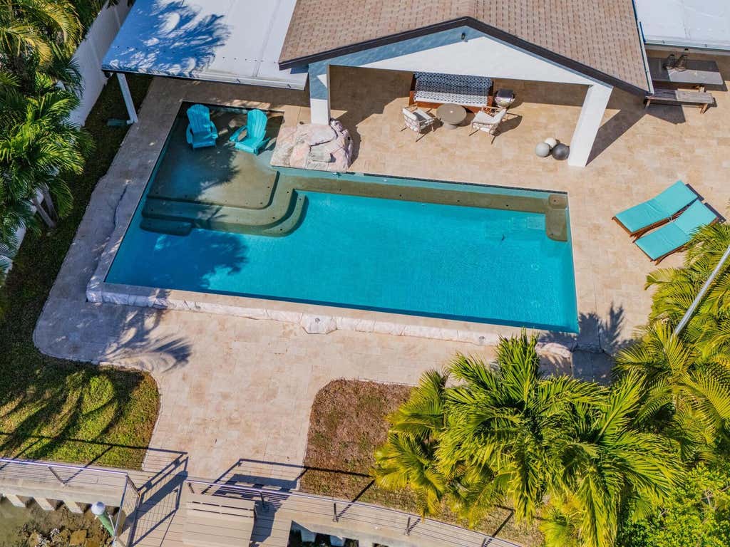 Photo of 1028 79th Street S, St Petersburg, FL 33707 (MLS # TB8535674)
