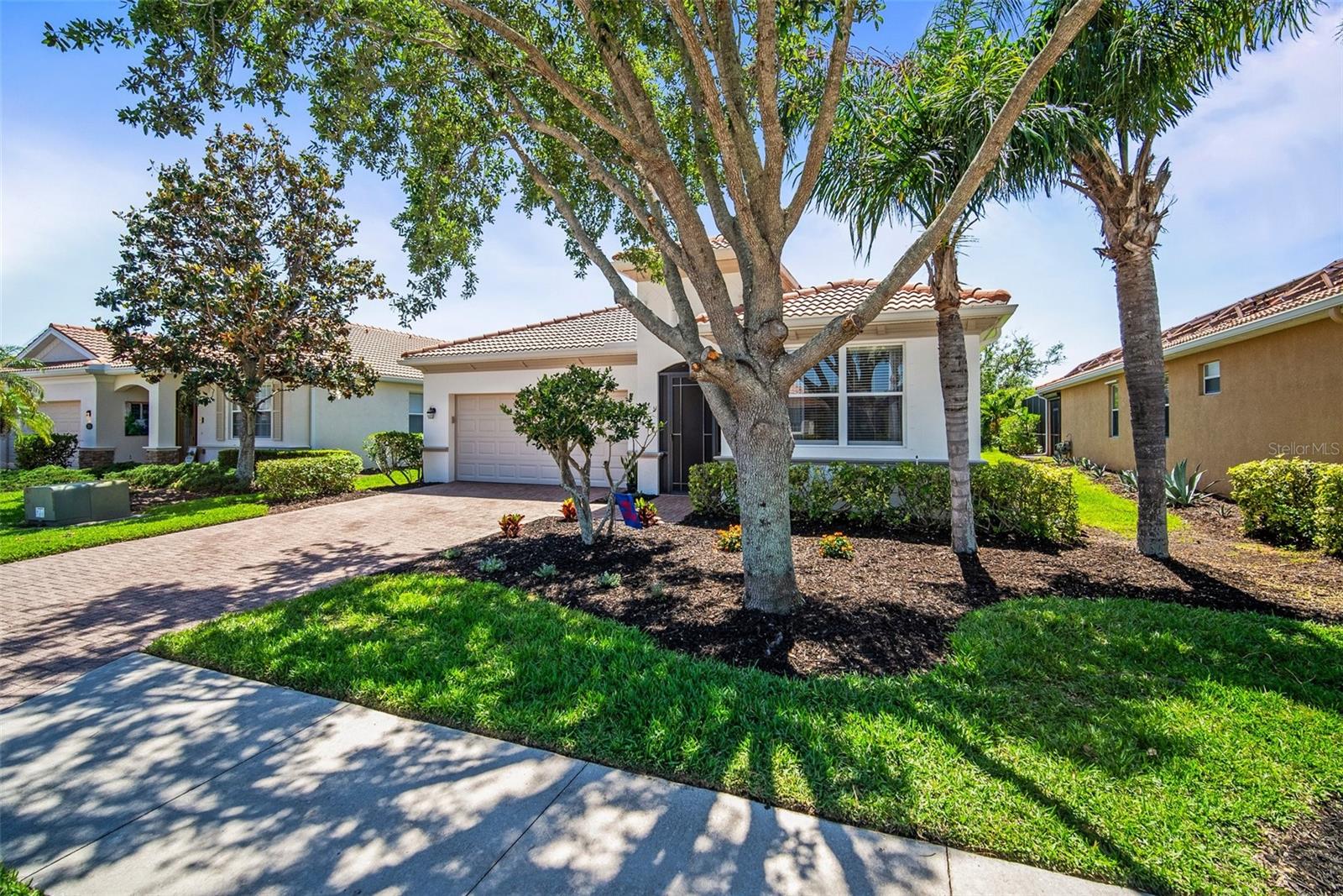 Welcome to your dream home with FULL GOLF & SOCIAL MEMBERSHIP in the highly sought-after River Strand Golf & Country Club! This beautifully maintained single-family residence offers 3 spacious bedrooms, 2 full bathrooms, and a private heated pool and spa – perfect for year-round relaxation and entertaining.
Step inside to a light and bright open-concept layout, enhanced by full sliding glass doors that bring in natural light and create seamless indoor-outdoor living. The home has been freshly painted inside and out, and features stylish new light fixtures and ceiling fans throughout.
Enjoy the convenience of a newly installed refrigerator, washer, dryer, and garage door opener. The garage also boasts upgraded lighting and custom shelving for added storage. The lanai has been rescreened and thoughtfully updated with relocated pool controls for easy access inside the lanai area.
Other highlights include upgraded landscaping that enhances the home’s curb appeal, and a recently inspected and professionally cleaned roof, ensuring peace of mind.
Immerse yourself in the renowned 27-hole Arthur Hills designed golf course, recently revitalized by the esteemed Andrew Green. Perfect your swing amidst breathtaking views and lush fairways, elevating every round to a true golfing experience. Tennis enthusiasts will delight in the 9 Har-Tru Tennis Courts, while pickleball enthusiasts can enjoy friendly matches on the 8 dedicated courts. Dive into relaxation at the 2 Resort-Style Pools, or seek solace at any of the 6 Satellite Pools scattered throughout the community, each offering a serene oasis to unwind. Indulge your palate and socialize at the Clubhouse, featuring a distinguished restaurant and hosting a myriad of engaging social events. The Community Center serves as a focal point for gathering, fostering connections and camaraderie among residents. Maintain an active lifestyle with access to 2 fitness centers, equipped with state-of-the-art facilities and expert trainers to support your wellness journey. Enjoy the convenience of 24-hour security and lawn maintenance, ensuring peace of mind and pristine surroundings throughout the community. Conveniently located just minutes away from I-75, UTC of Sarasota and the Gulf Coast's pristine beaches, this unparalleled community offers the perfect blend of convenience and luxury living. Experience luxury living at its finest in this meticulously maintained home in River Strand Golf and Country Club. Don't miss the opportunity to make it yours and start living the lifestyle you deserve!
Don’t miss this opportunity – schedule your private showing today!