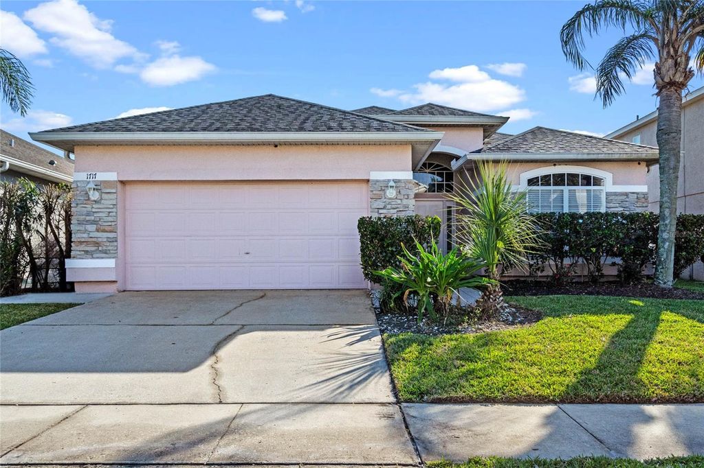 Photo of 1717 White Heron Bay Circle, Orlando, FL 32824 (MLS # O6364473)