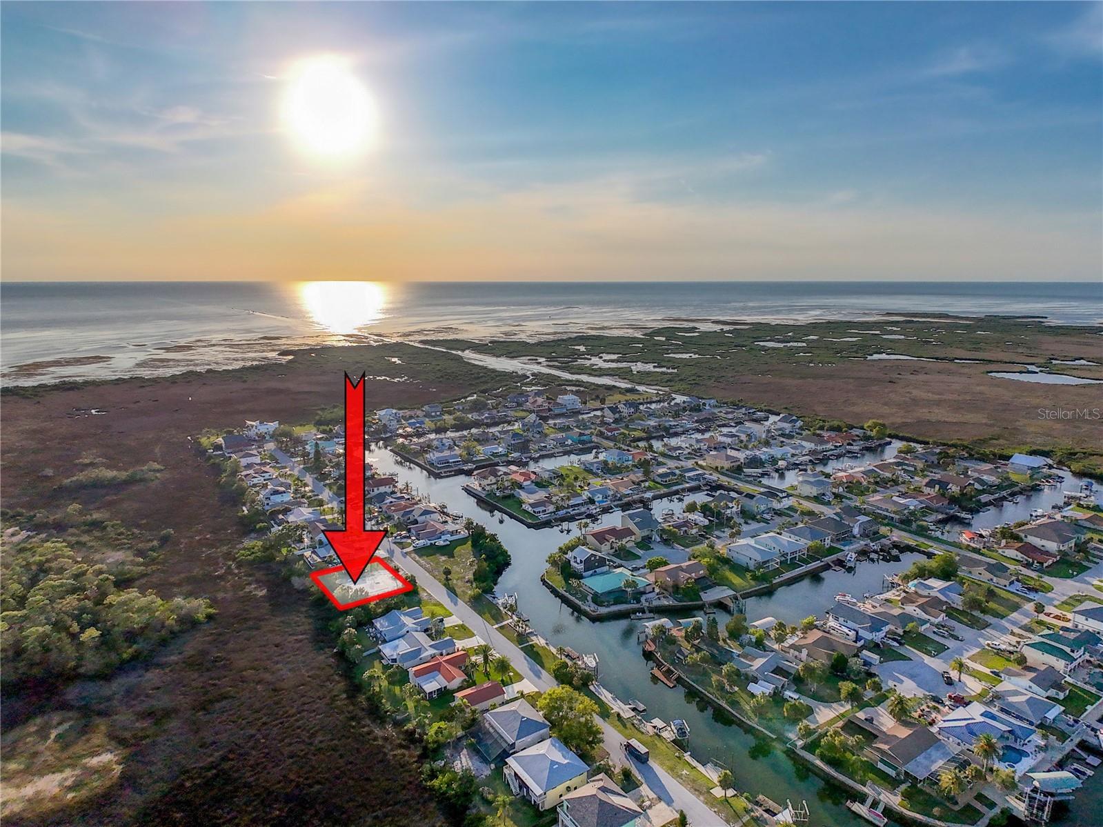 Welcome to 7114 Southwind Drive in Hudson, Florida — a rare and exceptional opportunity to build your dream coastal retreat in the exclusive Preserves of Sea Pines. Set on a shovel-ready double lot backing to a forever-protected coastal bird sanctuary, this homesite offers unmatched privacy, peace, and natural beauty with no rear neighbors — only preserved land and wildlife at your back door.
What sets this property apart is that the heavy lifting is already done. Permits and engineering are complete, deep underground pilings are installed, the reinforced concrete framing is in place, and the foundation and slab are ready to go. All of the time-consuming, expensive groundwork and paperwork has been handled — meaning you can start building right away. The current builder has a beautiful custom plan already in place and states the home can be completed in as little as six months. Or, bring your own builder and design your vision from the ground up.
Also included are two deeded boat slips at the private community mooring, located just one minute from your future front door. From there, you’ll enjoy direct access to the open Gulf — perfect for island-hopping to Anclotte, sunset cruising, or boating to your favorite waterfront restaurants.
Located just an hour from Tampa International Airport and two hours from Orlando’s world-famous attractions, Hudson blends laid-back coastal charm with unbeatable convenience. This is the ultimate salt life destination — where nature, boating, and barefoot luxury come together.
Call today to learn more and take the next step toward turning this extraordinary opportunity into your forever home.