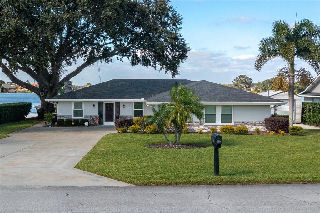 Photo of 6707 Winterset Gardens Road, Winter Haven, FL 33884 (MLS # P4936864)