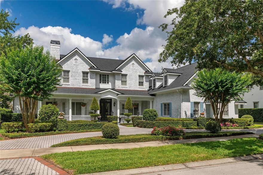 Enjoy luxurious living in Winter Park’s coveted Windsong Northshore neighborhood with this gorgeous, custom home located in a quiet, secluded, and natural setting just a short stroll from Lake Berry and Lake Mizell. Enter this 6-bedroom, 4 full bath, 2 half bath Parkland pool home on Genius Drive through an impressive foyer with new marble floors. A living room to the left features a beautiful gas fireplace and built ins. A formal dining room with beautiful custom molding leads to a large, open family room. A newly updated open gourmet kitchen includes a Wolf 6-burner gas stove, Thermador double ovens, a large walk-in pantry, 2 pull out refrigerator drawers, a warming drawer and Wolf coffee maker. The 1st level primary suite features an oversized, newly renovated bathroom with double vanity sinks, a 3rd separate vanity, a new soaking tub and large walk-in shower. A large custom walk-in closet (11’x14’) offers ample space. A second large, first floor bedroom is currently used as an office, with the other 4 spacious bedrooms located on the second floor. Also upstairs is a bonus room currently being utilized as a home theater. This 5,473 sq. ft. masterpiece on a canopied, tree-lined street includes a lovely front yard with circular driveway and front porch, and new light fixtures and plantation shutters throughout. Offering the ultimate in privacy, the fully fenced-in backyard opens to a large, accessible outdoor field with no rear neighbors. The retiled saltwater pool, fire pit, and newly renovated outdoor summer kitchen is the perfect place to relax or entertain friends or family. This exceptional location includes access to a private lakefront activity/community center. The home features a 3-car garage, one bay which is currently being used as a home gym. Move right into this exceptional home in one of Winter Park’s most sought-after locations.