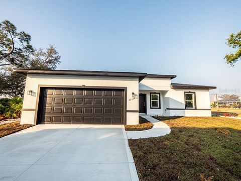 Photo of 23419 Gemstone Avenue, Port Charlotte, FL 33980 (MLS # O6382154)