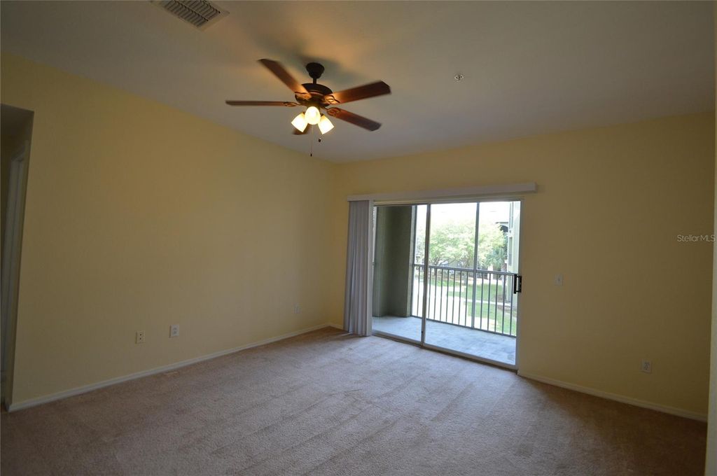 Photo of 13113 Sanctuary Cove Drive #204, Temple Terrace, FL 33637 (MLS # O6394819)