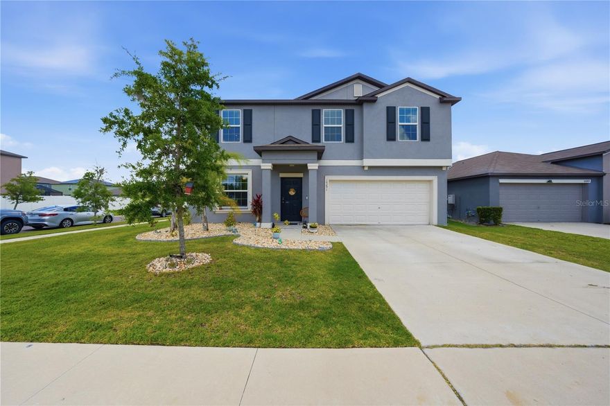 Welcome to this beautiful and well maintained 2022-built home loaded with thoughtful upgrades and modern features in the beautiful South Creek community. This two-story residence offers 2,635 sqft of living space, 4 bedrooms, 2.5 bathrooms, and one of the LARGEST CORNER LOTS in South Creek — a spacious 60 ft x 120 ft lot with a truly massive backyard.

Inside, you’ll enjoy an inviting open-concept layout with a dedicated office ideal for remote work, a freshly updated half-bathroom, and a gourmet kitchen featuring stainless steel appliances, a new French-door refrigerator, an oversized island, and upgraded granite countertops throughout. Upstairs, a generous loft area and four bedrooms provide comfort and privacy, highlighted by the primary suite with an ensuite bathroom offering dual sinks and a large walk-in closet. The second floor laundry room features plenty of space for your needs.  The guest bedrooms all have double closets with extra depth and ceiling fans installed in every bedroom!

Outside, the expansive fully fenced backyard (with durable PVC fencing) — the perfect outdoor retreat for entertaining, pets, and play — with plenty of room remaining for a future pool and green space. This meticulously maintained home also offers double-pane energy-efficient windows, hurricane shutters, an outdoor irrigation system, natural gas, a tankless water heater, an ADT security system, 6 years of structural warranty remaining from the builder, and a 2-car garage.

South Creek residents enjoy access to a clubhouse, resort-style swimming pool with cabanas, playgrounds, community park, Dog Park, and walking trails. Conveniently located just minutes from shopping, dining, entertainment, and I-75, with Publix, Costco, and Target, and more being constructed with quick access to Grace Sweat street: The best way to shorten your commute for residents and currently under construction. Apollo beach and boat launches are extremely close to enjoy the Florida life! 

The surrounding Schools are top rated with an abundance of private charter and public schools all within a 5 minute commute from South Creek! 

Pride of ownership shines throughout this rare find. Schedule your private showing today!