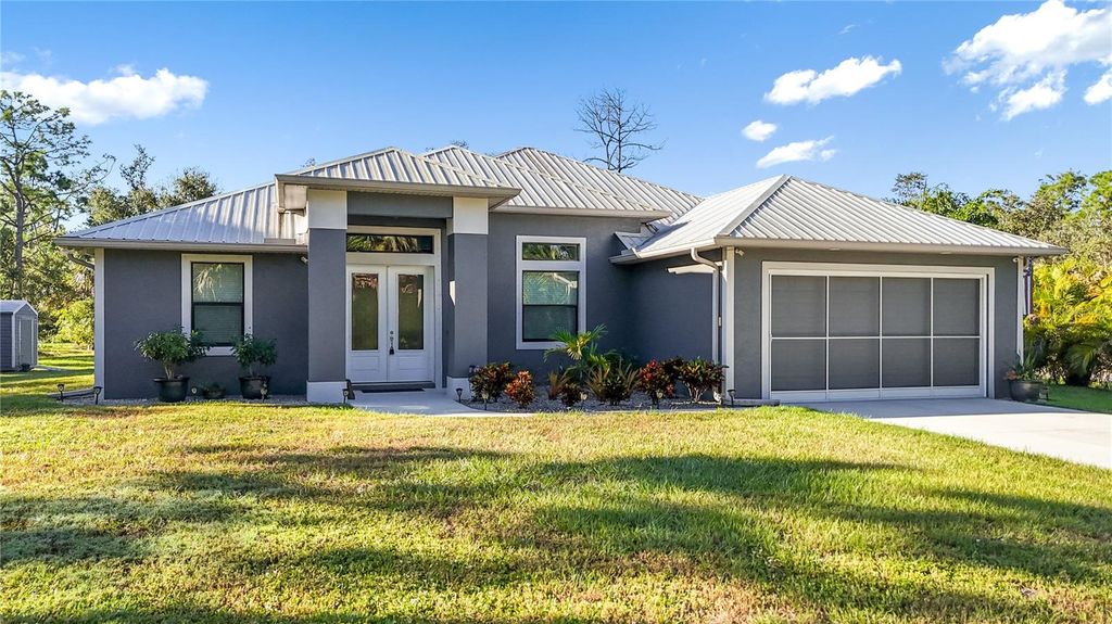 Photo of 3136 Joshua Street, Port Charlotte, FL 33948 (MLS # C7515901)