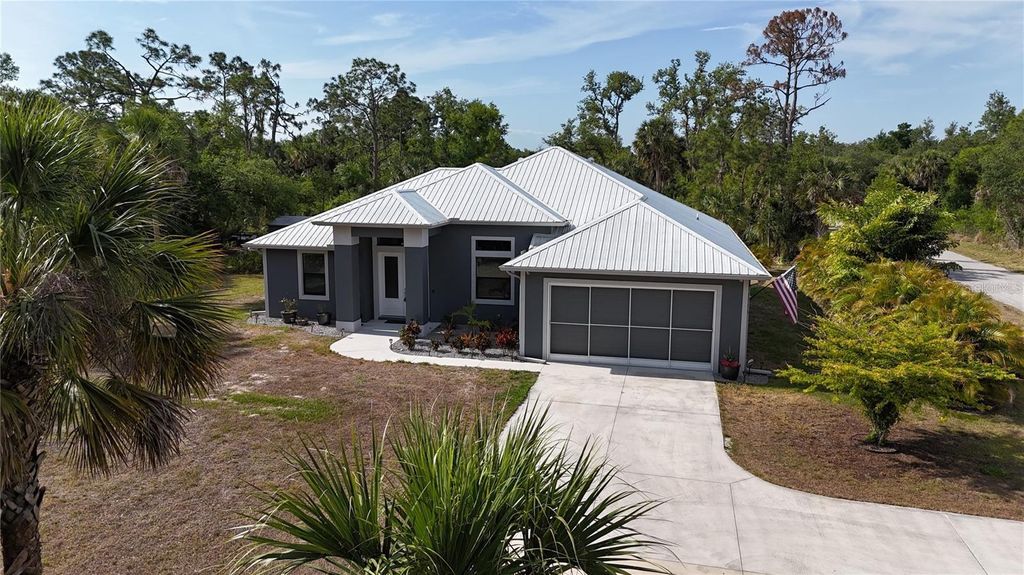 Photo of 3136 Joshua Street, Port Charlotte, FL 33948 (MLS # C7515901)
