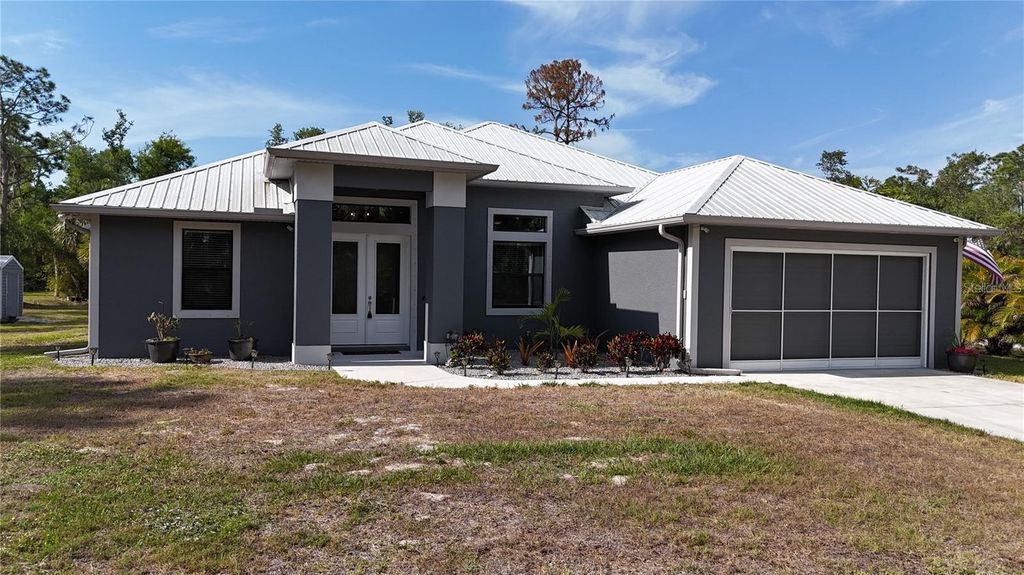Photo of 3136 Joshua Street, Port Charlotte, FL 33948 (MLS # C7515901)