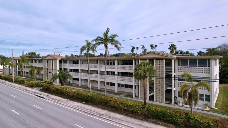 Prime Coastal Living in St. Petersburg! Located just minutes from the pristine white sands of Madeira Beach and the
vibrant attractions of the Gulf communities, this condo offers the ultimate Florida lifestyle. Explore water sports, stroll
through John's Pass, indulge in top-notch restaurants, shop unique boutiques, or simply relax and enjoy the area's
tropical charm. Nestled on the 2nd floor, this spacious 1,060 sq. ft. condo boasts 2 bedrooms, 2 bathrooms, and a
bonus enclosed front porch. Start your mornings with a cup of coffee on the sunlit patio or transform it into a cozy
second living space perfect for relaxing or entertaining. Recent improvements include beautiful tile flooring in the main living space with new carpet in the bedrooms. The guest bedroom offers a walk-in closet and built in Murphy bed allowing the room to transform from a guest bedroom to a home office. Whether you're looking for a seasonal retreat or a year-round residence, this condo is your gateway to everything Florida has to offer. Walk or bike to the waterfront, soak up the sunshine, and embrace the relaxed coastal lifestyle. Don’t miss out—your
next home away from home awaits!