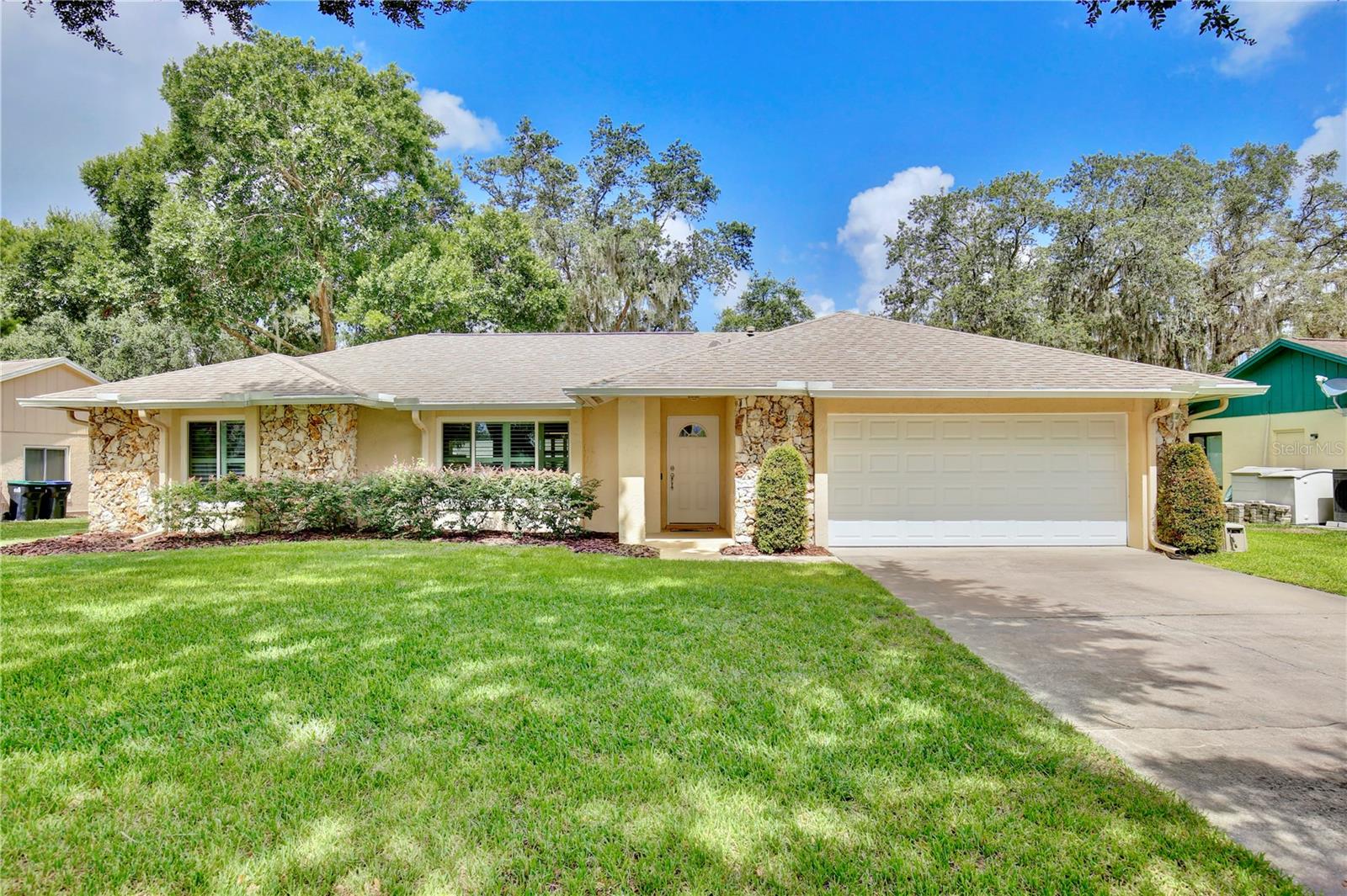 Welcome home to this meticulously cared-for residence, ideally situated on a spacious oversized lot in a quiet, established neighborhood near Winter Park. This property offers the ultimate blend of comfort, security, and convenience, making it the perfect family home in the heart of Central Florida.
Enjoy true peace of mind with extensive, high-value upgrades completed in recent years: a new roof (2017) providing long-term protection, and a new fence (2018) enclosing a spacious backyard – perfect for pets and outdoor entertaining. The entire home features hurricane wind-rated vinyl windows (2020), offering superior storm protection and energy efficiency, complemented by elegant plantation shutters throughout. An updated irrigation system (2023) keeps your lush lawn vibrant with ease.
This home is zoned for desirable highly-rated schools! Enjoy the community with an optional HOA, granting you access to a well-maintained neighborhood playground with new equipment and a dog run overlooking Lake Georgia.
This home’s location is paramount! Benefit from convenient access to the 417, simplifying your commute. You're just a short drive from major employment hubs and educational institutions like UCF and Valencia College East Campus. Explore the outdoors on the nearby South Seminole Trail, or indulge in endless shopping, dining, and entertainment options at Waterford Lakes Town Center, charming Winter Park, and Oviedo.
This is more than just a house; it's situated in a highly sought-after area, offering a lifestyle of comfort, convenience, and accessibility. Don't miss the opportunity to own this move-in ready home.