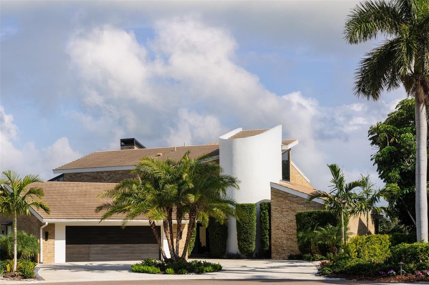 A rare architectural jewel where every room captures breathtaking views, this Bayway Isles
estate is both a Mid-Century Modern masterpiece and a serene retreat. Reimagined in 2023 by
acclaimed designer Lisa Gilmore, every element of the extensive renovation was curated with
intention, blending bold style and sophistication with modern comfort, safety, and
convenience. Featured in Florida Design and showcased by Architectural Digest, the home
reflects the perfect balance of architectural significance and contemporary luxury.
Seven sets of expansive impact-rated glass doors frame 161 feet of waterfront, uniting modern
protection with a design that invites the outdoors in. Outside, lush tropical landscaping,
expansive waterfront terraces, an outdoor speaker system, and a sparkling pool and spa make
this home the perfect luxury retreat and an entertainer’s dream.
Inside, soaring vaulted ceilings and exquisitely composed spaces strike a balance of drama and
refinement. The chef’s kitchen is a true centerpiece with bespoke cabinetry by T2theS, a
custom brass bar, and a hidden door that leads to an oversized mudroom and pantry. The
primary suite boasts a private glass atrium that immerses you in nature and reflects the
glistening water, paired with a spa-like bathroom featuring a jetted steam shower and soaking
tub. Each of the four bedrooms and four-and-a-half baths has been expertly curated to make
every space feel special.
Additional highlights include hurricane-rated windows and doors, a state-of-the-art movie
room, custom cabinetry, and in-ceiling speakers that extend to the outdoor living areas. Voice-
activated Lutron Caséta lighting, automated window shades, and a fully integrated smart
speaker system ensure effortless control throughout. Two private slips with power provide
deep-water, no-bridge Gulf access via 30,000- and 9,000-lb lifts, making this property a true
boater’s paradise.
Set within Bayway Isles, a 24/7 guarded community, just minutes from downtown St.
Petersburg and the beaches, this home offers both tranquility and convenience. More than a
residence, it is a statement of vision, artistry, and refined modern living. Schedule your private
tour today.