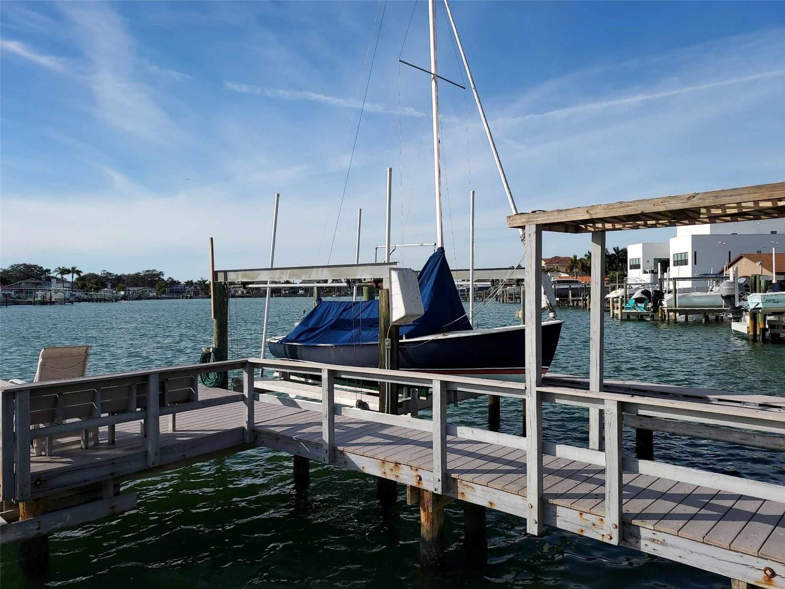 Investors dream located within Yacht Club Estates. End of cul de sac 2 story floorplan with 4 or 5
bedrooms 4 baths, 2 car garage, large balconies front and back. Prime location on the water. Large backyard with covered patio, wet bar, heated pool & spa, beautiful water view, as well as a huge garden. Deck and boat lift are also a bonus with this home.