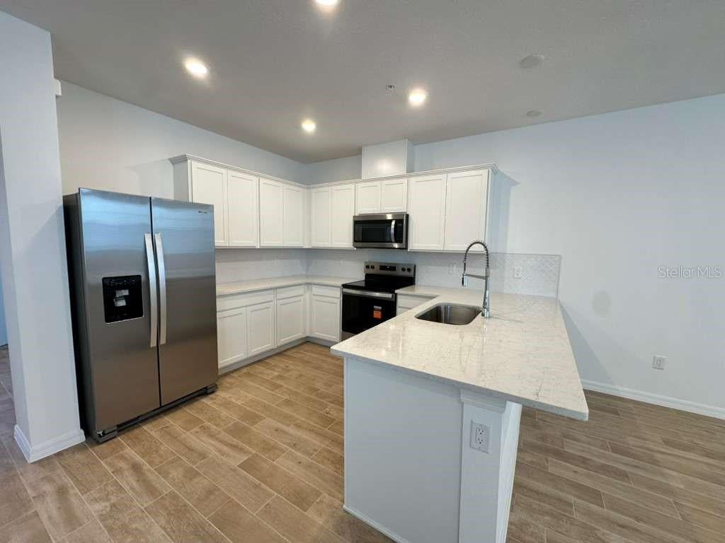 Photo of 4544 Orchard View Alley, Clermont, FL 34714 (MLS # O6438337)