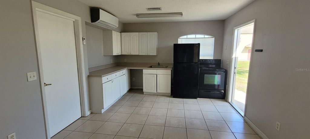 Photo of 406 Washington Palm Loop, Davenport, FL 33897 (MLS # S5147637)