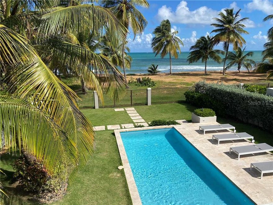 This spectacular beachfront luxury villa is a perfect setting for a beach lifestyle! Located on one of the most beautiful beach of the north east coast of Puerto Rico, in a gated community, close by three great resorts, the Wyndham Grand Rio Mar, Hyatt Regency Grand Reserve, St Regis Bahia with world class golf courses, amenities and membership programs. As you walk through this house, you will feel captivated by the natural beauty and privacy of the setting as well as the amazing ocean and forest views if offers. The house features approximately 3500 sq.ft. of living area distributed among two floors. You will find throughout a great attention to details, quality materials and tasteful decoration. Downstairs, an open layout connects a large modern kitchen with the dining, family room and a huge covered terrace overlooking the pool and beach. The high ceilings and french doors connecting to the terrace provide a nice sensation of openness, entrance of lots of natural light, and great ventilation. The first floor has 3 bedrooms and 2 bathrooms. Upstairs, there are two spacious master bedrooms each with ensuite bathroom and a private terrace offering a very relaxing setting with beautiful pool, beach and ocean views. One of the master bedrooms has a second private terrace with a magical view to "El Yunque" National Rainforest.
This home is close (15 minute drive) to Puerto Rico’s best attractions, including Kite and paddle boarding lessons, snorkeling, golf, zip lining, horseback riding, hiking, ATV’s, bio bay tours and more. It is a short 45 minutes drive to San Juan airport (SJU) or to visit the history, culture and culinary resources of the old city. Tax incentives for act 20-22 investors may apply.