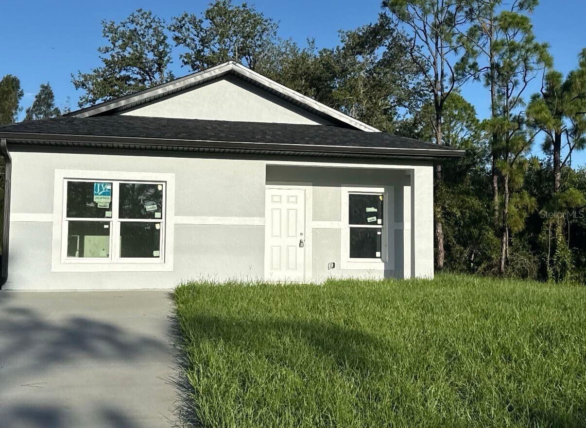 Welcome to 13043 Apache Drive in Punta Gorda, FL! This newer construction home offers a serene setting with a large back yard, perfect for pets to roam freely. The eat-in kitchen features granite counters and all tile floors throughout the house. Enjoy the open rear lanai for outdoor relaxation. The primary bedroom includes an en-suite with a large tiled shower for added convenience. With two bedrooms and two bathrooms, this home provides ample space for comfortable living. Located in a great area of Punta Gorda, this property is a must-see for those seeking a peaceful and modern living environment. Pets are welcome in this lovely home. Schedule your private tour today!