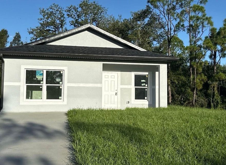 Welcome to 13043 Apache Drive in Punta Gorda, FL! This newer construction home offers a serene setting with a large back yard, perfect for pets to roam freely. The eat-in kitchen features granite counters and all tile floors throughout the house. Enjoy the open rear lanai for outdoor relaxation. The primary bedroom includes an en-suite with a large tiled shower for added convenience. With two bedrooms and two bathrooms, this home provides ample space for comfortable living. Located in a great area of Punta Gorda, this property is a must-see for those seeking a peaceful and modern living environment. Pets are welcome in this lovely home. Schedule your private tour today!