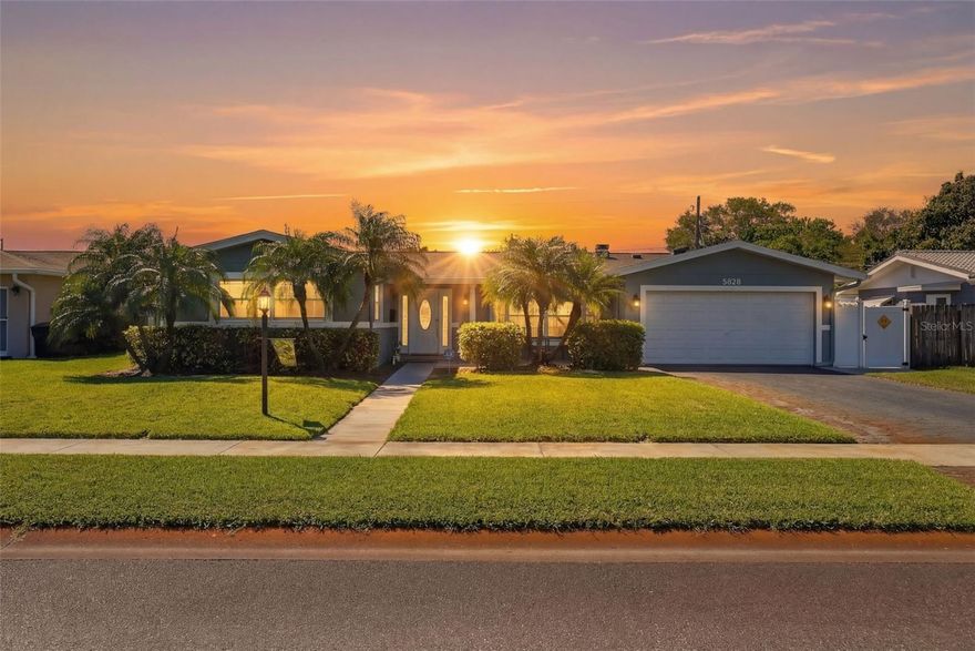 Experience Florida living with a $0 ELECTRIC BILL in this beautifully curated single-story residence featuring fully paid for 16KW solar panels. Perfectly positioned 2 blocks from Northwest Park with its walking paths, pool, tennis and basketball courts, and baseball fields. Just minutes from Tyrone Mall, the Gulf beaches, and the vibrant downtown St. Petersburg, this home offers a rare blend of efficiency, comfort, and convenience in one exceptional setting. Thoughtfully done with quality upgrades throughout, the home showcases a seamless balance of style and function. A newer A/C system and recently updated exterior elements including roof, paint, and French doors provide peace of mind, while enhanced electrical improvements, including an upgraded panel, modernized wiring connections, updated switches and outlets, and ceiling fans, ensure both safety and sophistication. The kitchen is designed for both everyday living and effortless entertaining, featuring WiFi enabled smart ovens, updated appliances including refrigerator, microwave, dishwasher, and cooktop, plus a spacious kitchen sink, all thoughtfully integrated to complement today’s modern lifestyle. Step outside to a private outdoor retreat where a screened lanai invites relaxed indoor-outdoor living. The fully fenced yard offers generous space to design a custom pool, creating the opportunity to craft your own backyard oasis. Additional enhancements include a pavered pathway, hurricane screens, WiFi controlled irrigation system, and a custom Tuff shed for extra storage. A spacious 2-car garage adds both functionality and convenience, complemented by upgrades including a garage door lift system, integrated security and home automation, and an energy-efficient heat pump hot water heater. 
With its $0 electric bill, refined upgrades, pool ready outdoor space, spacious 2 car garage, and prime location, this home delivers the perfect combination of efficiency, convenience, and Florida lifestyle! Welcome home!