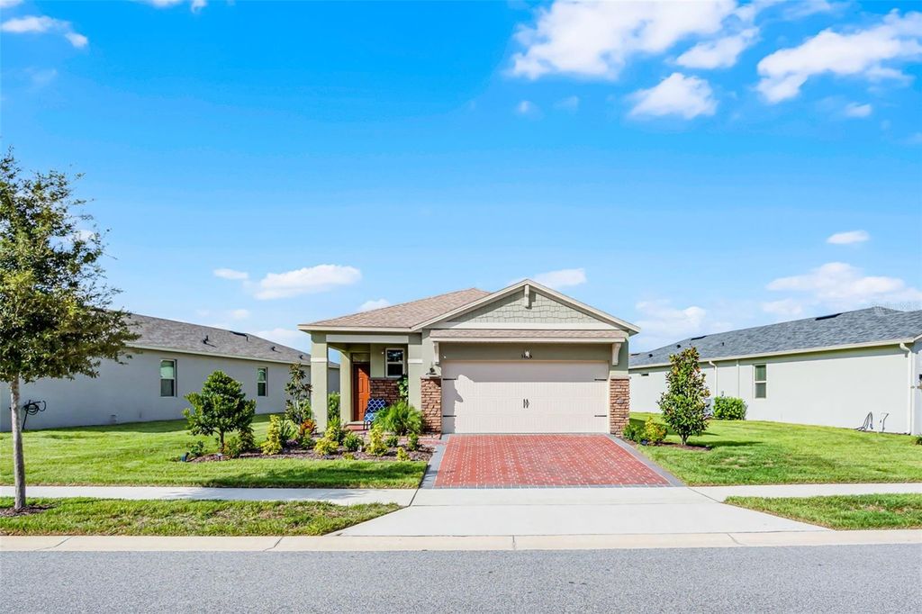 Photo of 3435 Yellowtop Loop, Clermont, FL 34714 (MLS # G5102358)