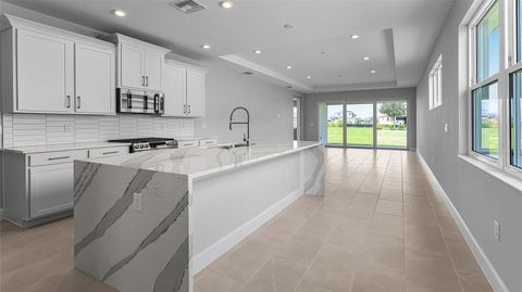 Tiny photo for 1467 Santorini Way, Tavares, FL 32778 (MLS # W7880587)