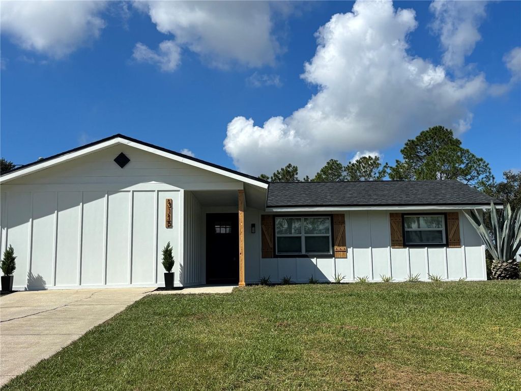 Photo of 3115 Foxwood Boulevard, Wesley Chapel, FL 33543 (MLS # TB8440197)