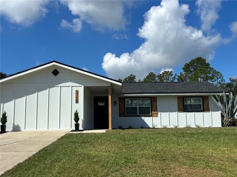 Photo of 3115 Foxwood Boulevard, Wesley Chapel, FL 33543 (MLS # TB8440197)