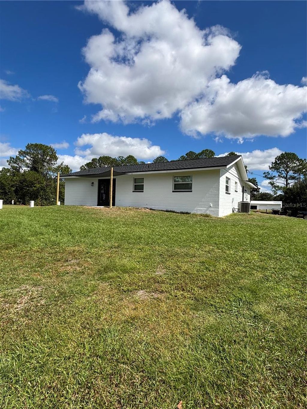 Photo of 3115 Foxwood Boulevard, Wesley Chapel, FL 33543 (MLS # TB8440197)
