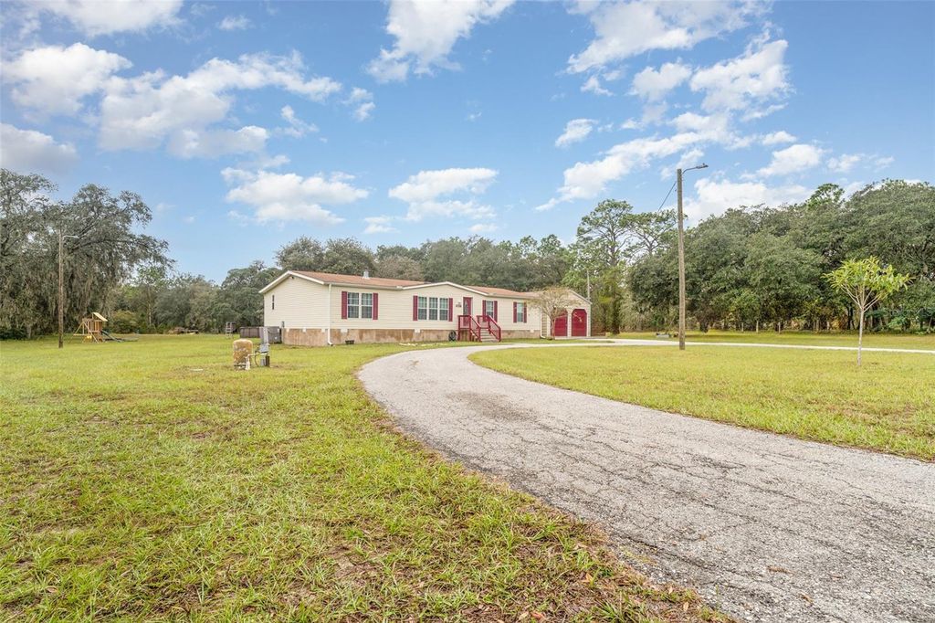 Photo of 4328 W Meadow Street, Homosassa, FL 34446 (MLS # TB8438979)