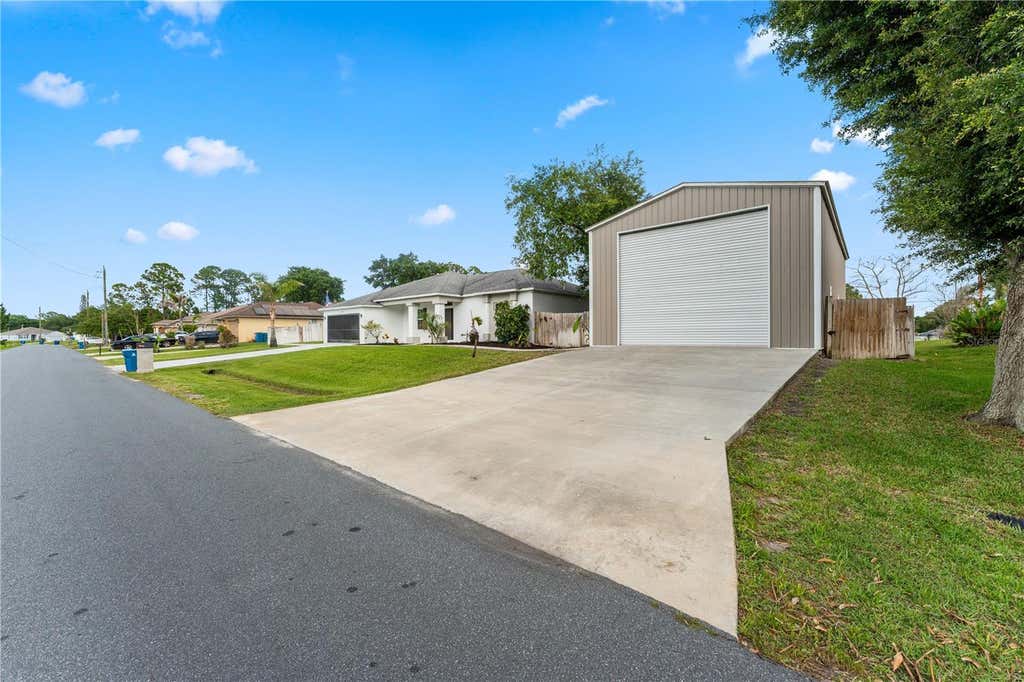 Photo of 2943 Toulon Road SE, Palm Bay, FL 32909 (MLS # O6412540)